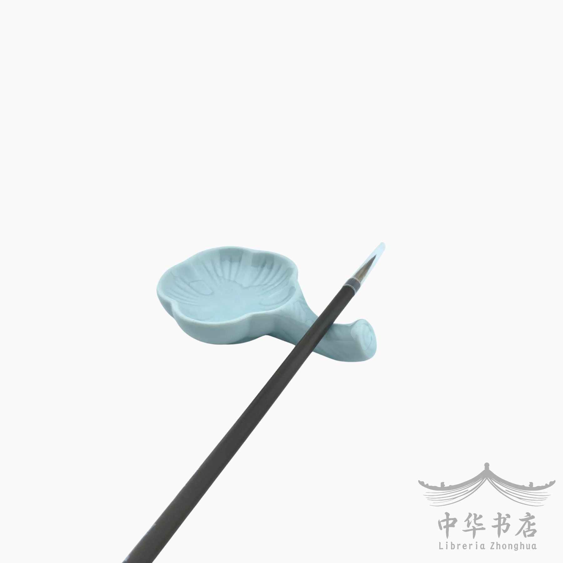 Posapinceles con tintero azul