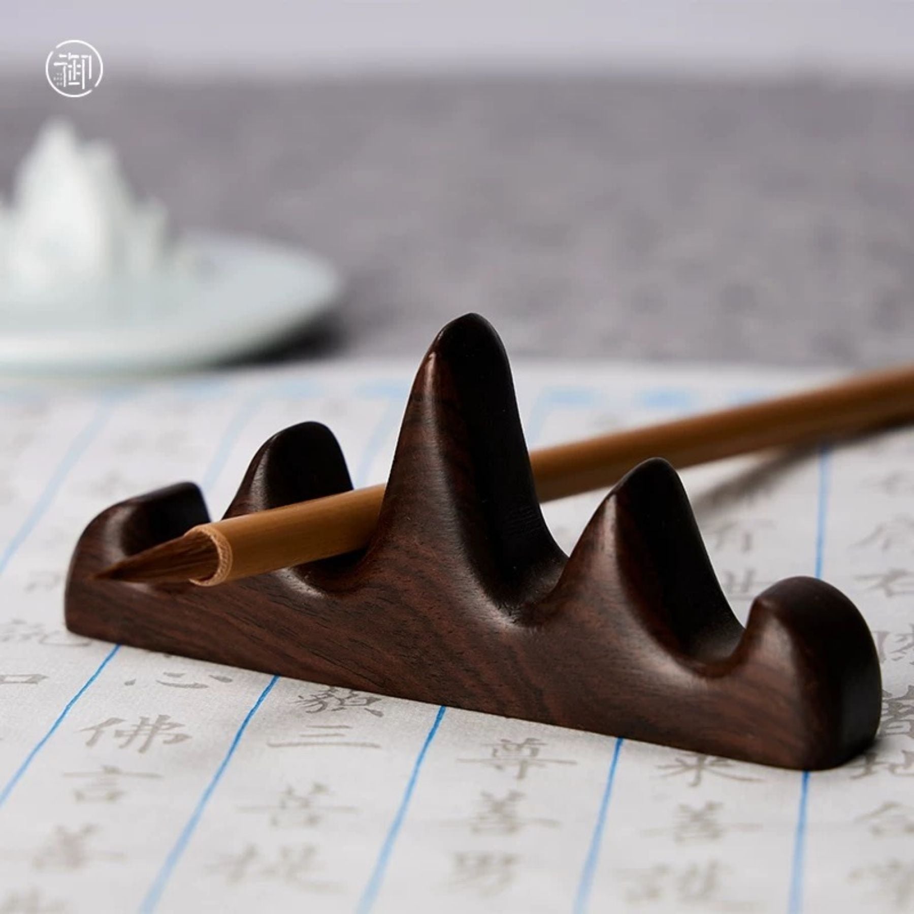 Posapinceles de madera