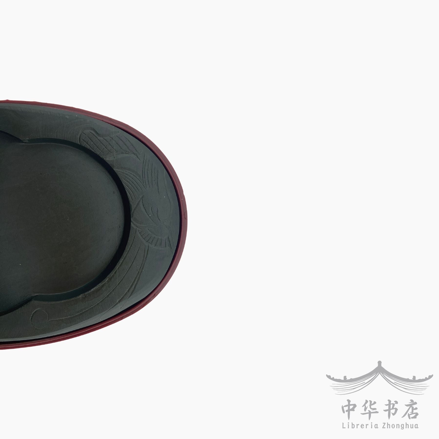 Piedra de entintar tallada